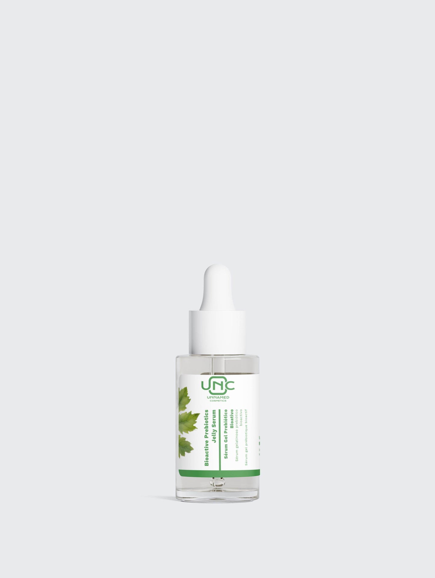 Sérum prebiótico vegan da Unnamed Cosmetics em frasco transparente com conta-gotas