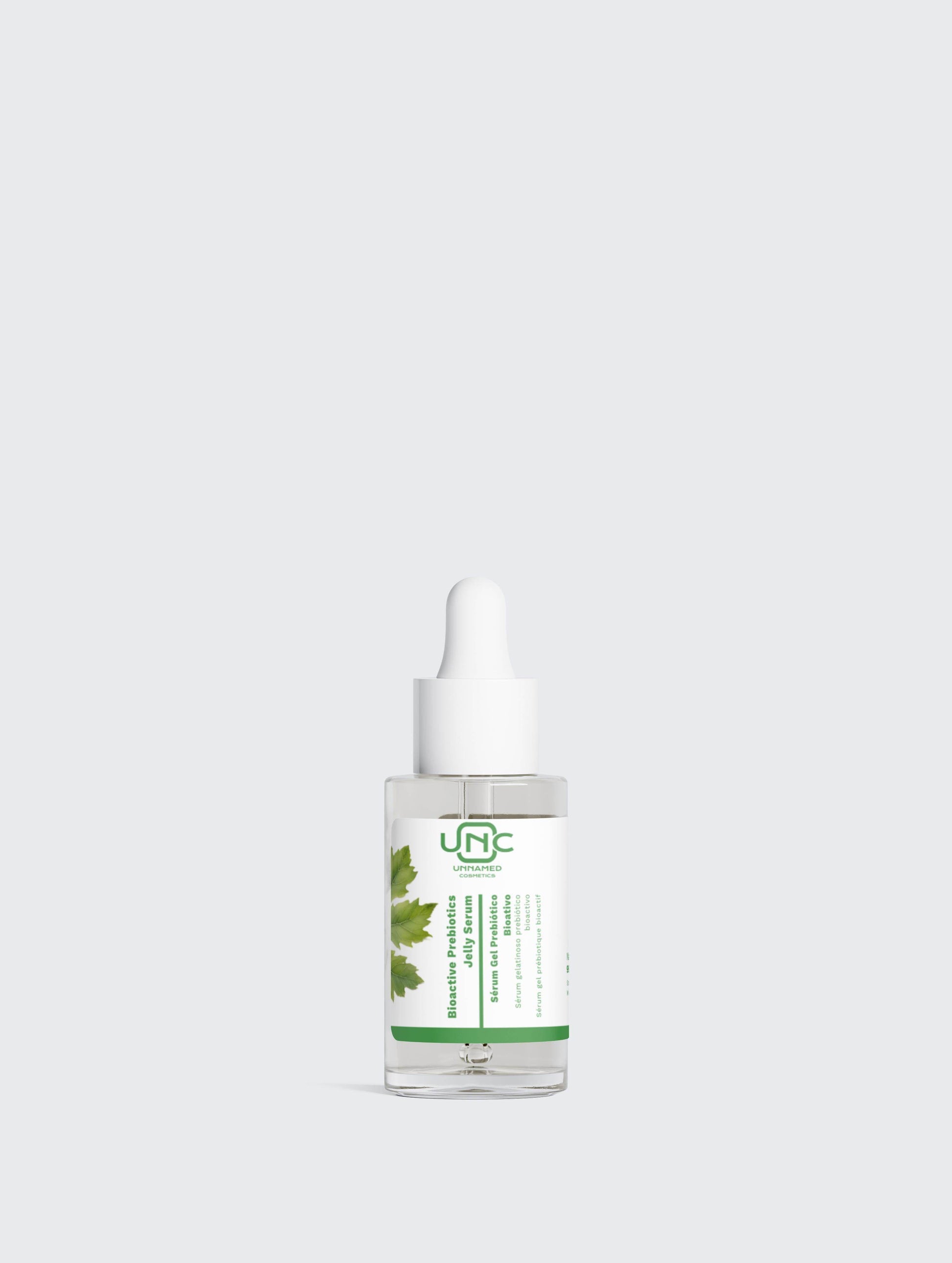 Sérum prebiótico vegan da Unnamed Cosmetics em frasco transparente com conta-gotas